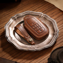 Load image into Gallery viewer, Genuine Leather Key Fob Cover for Toyota Tundra, Sequoia, Sienna, Camry, Corolla, Highlander, Prius Prime, RAV4 Prime, C-HR